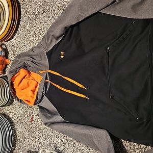 Size L kids under armor hoodie. Black, gray peach. This could be for boy or girl